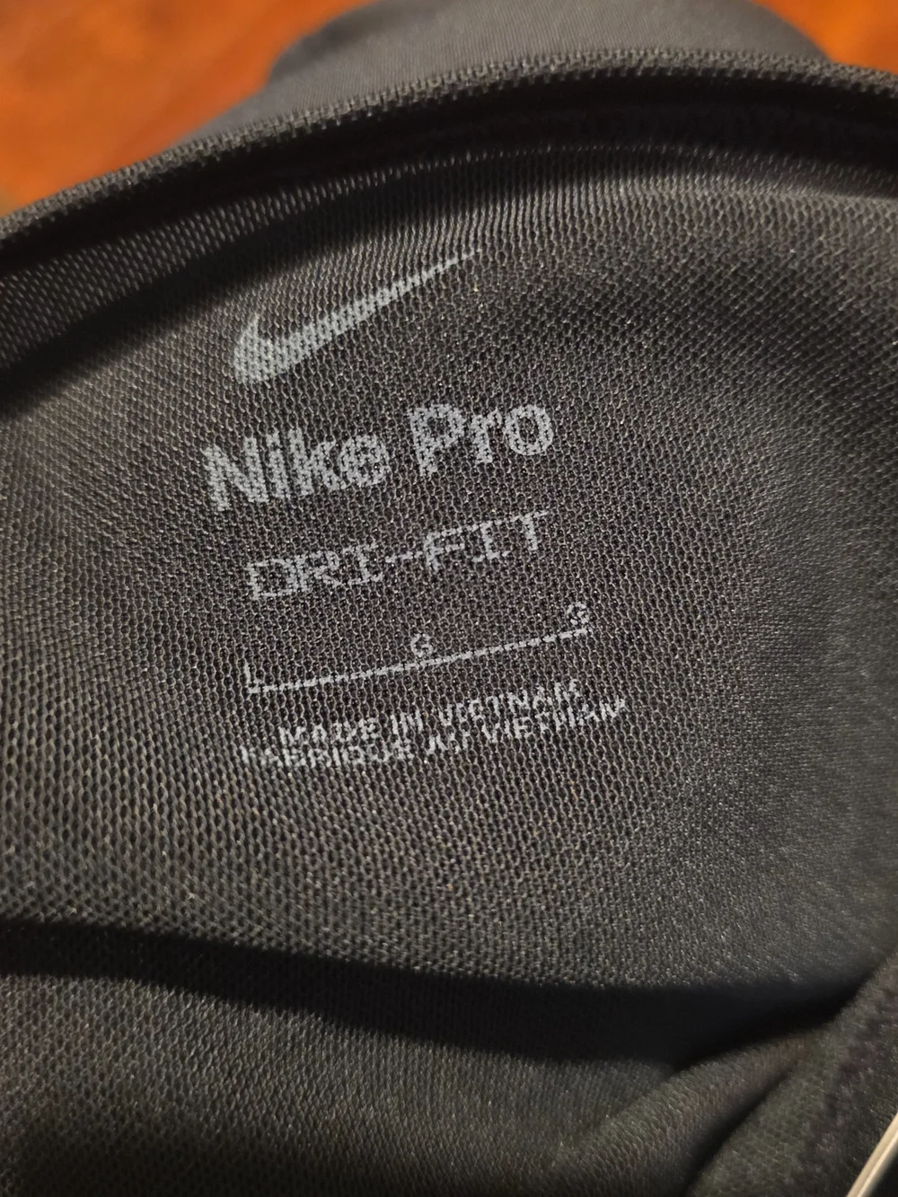 Nike Black Mesh-Panel Crop Sports Bra with White Swoosh